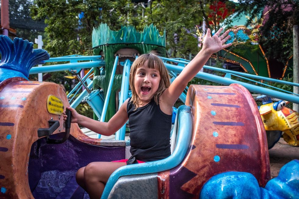 girl-on-amusement-park-ride