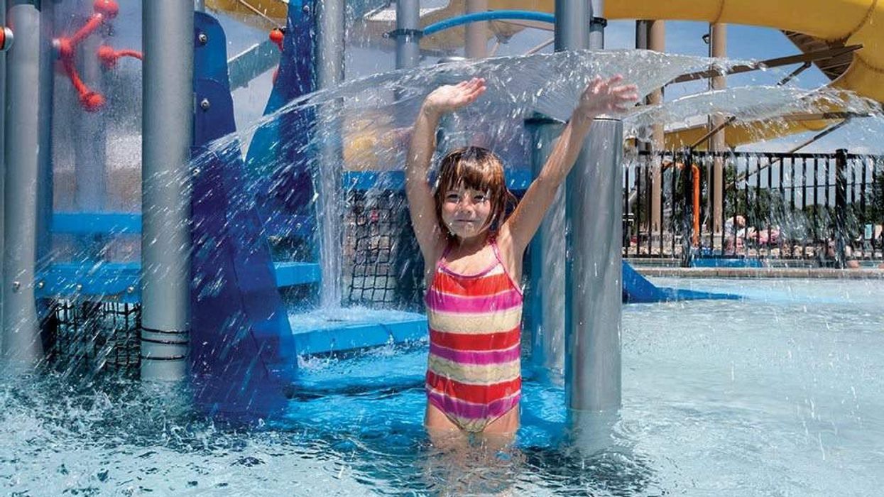 girl under water spout waterplay solutions sean hare