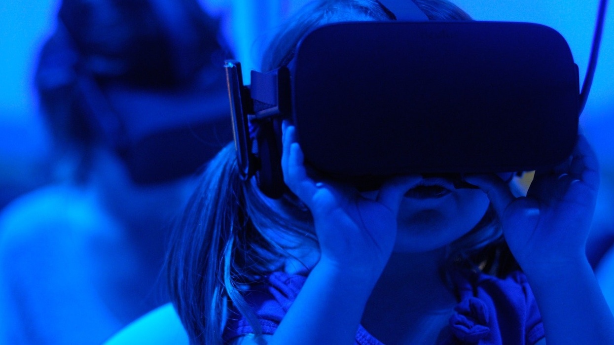 girl wearing VR goggles