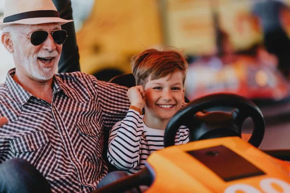 Grandfather-and-granson-on-bumper-cars