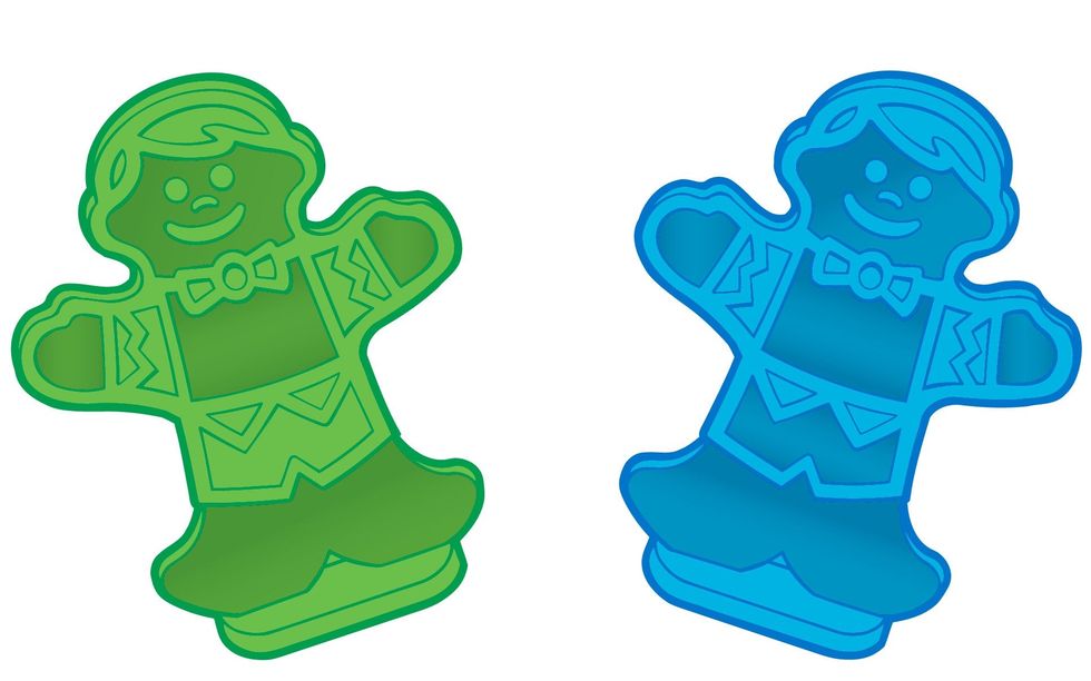 Green and blue gingerbread man cutters with smiling faces and decorative details.