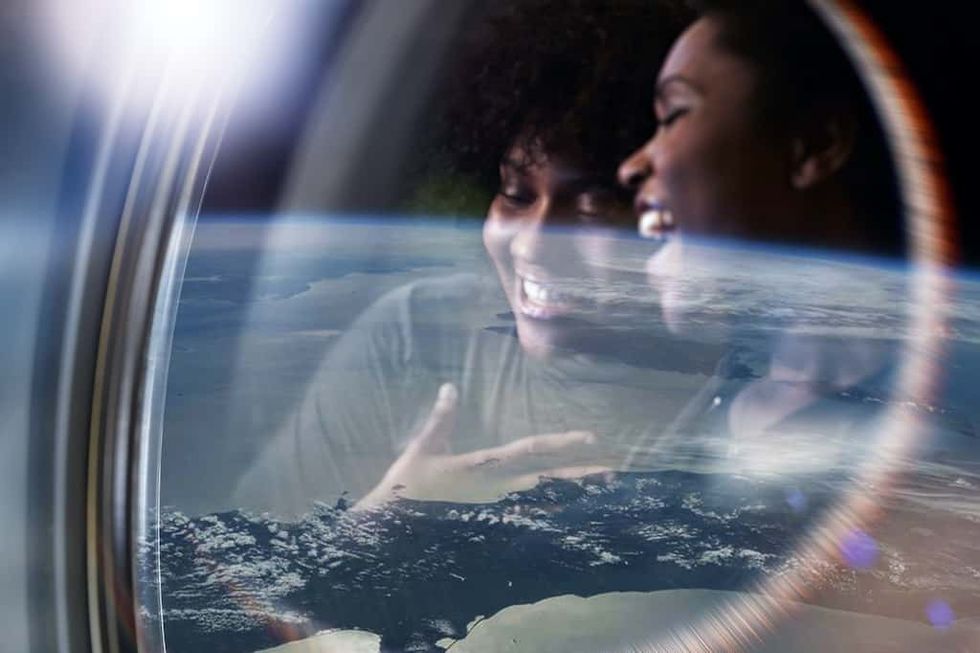 Guests enjoying view of Earth