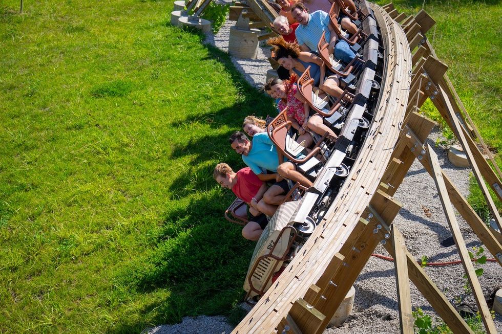 Guests on bank of zambezi zinger by Great Coasters International Worlds of Fun