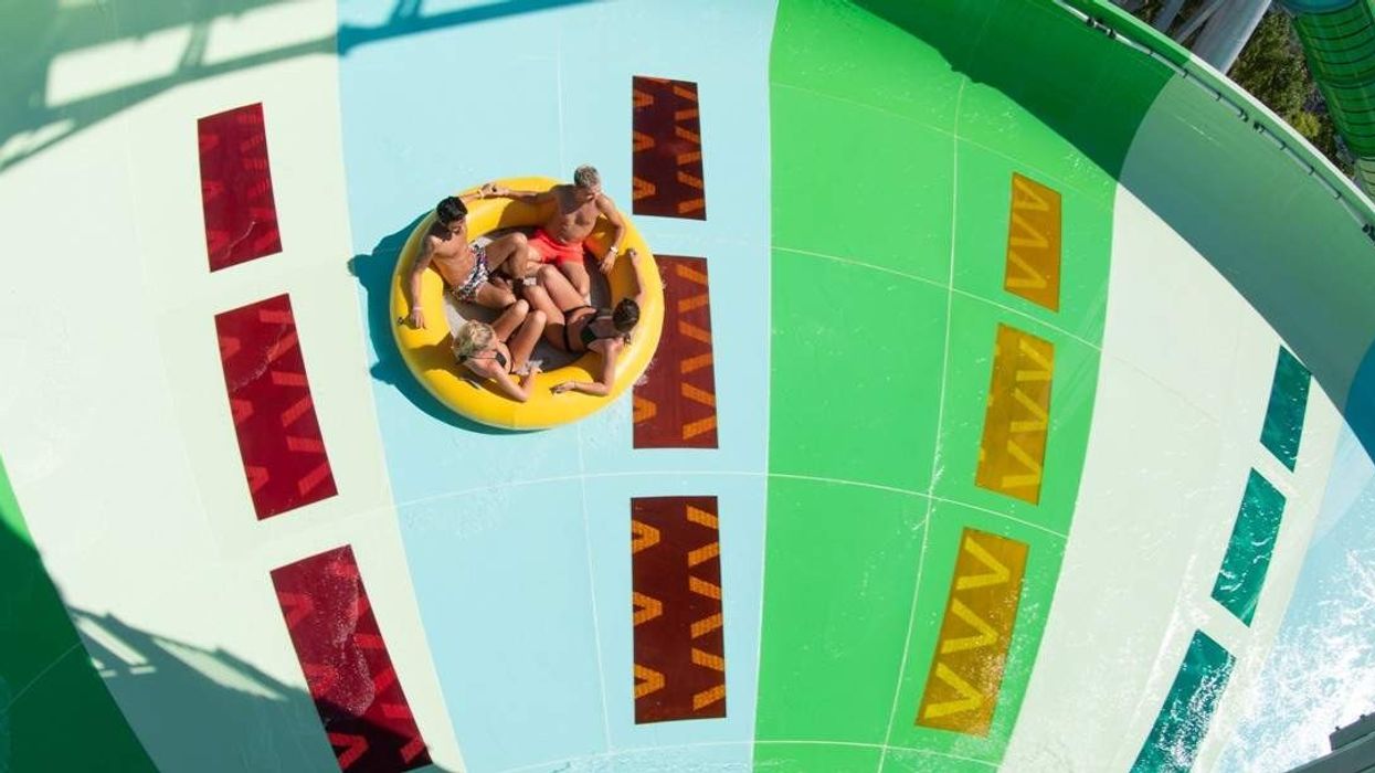 Guests on raft Polin Storm Racer waterslide at aqualand frejus