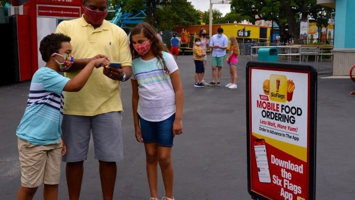Guests using the Six Flags mobile ordering app theme parks coronavirus