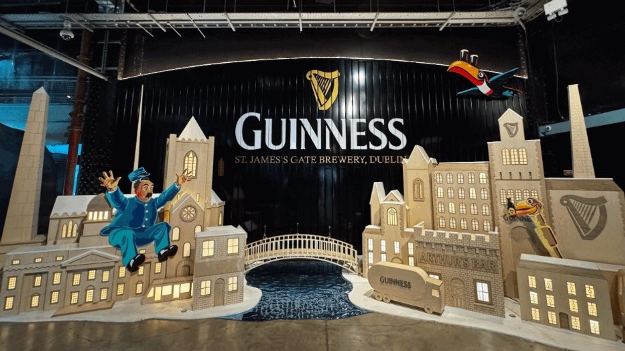 Guinness display with Dublin skyline, cartoon characters, and toucan at St. James's Gate Brewery