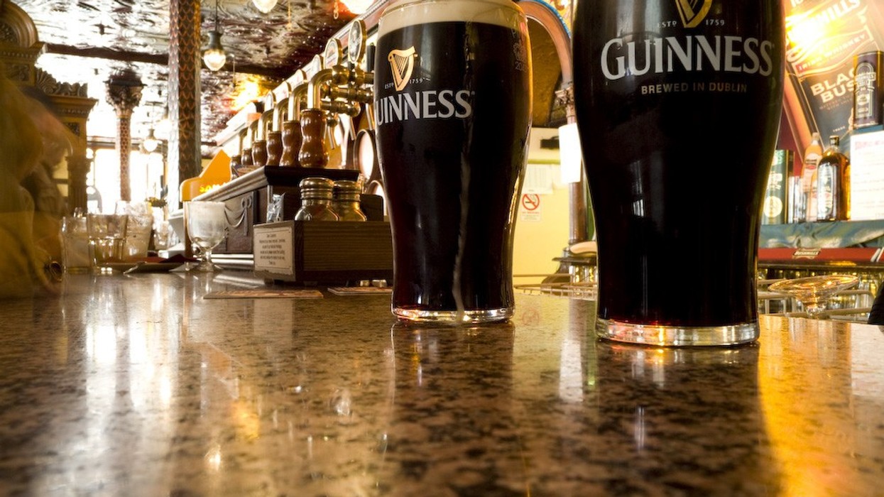 Guinnness pints on a bar Guinness storehouse
