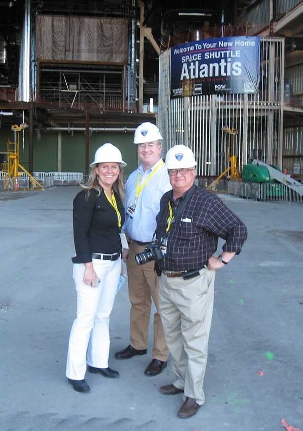Guyton, Mike Konzen and Howard with construction hard hats, PGAV Destinations