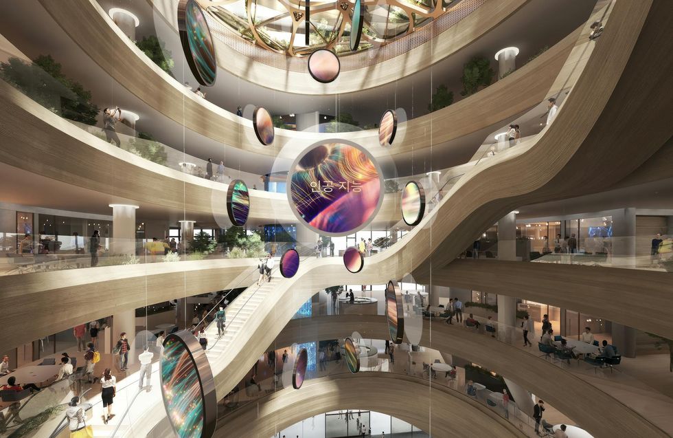Hana Banks modern atrium with curved walkways, hanging art, and bustling people.