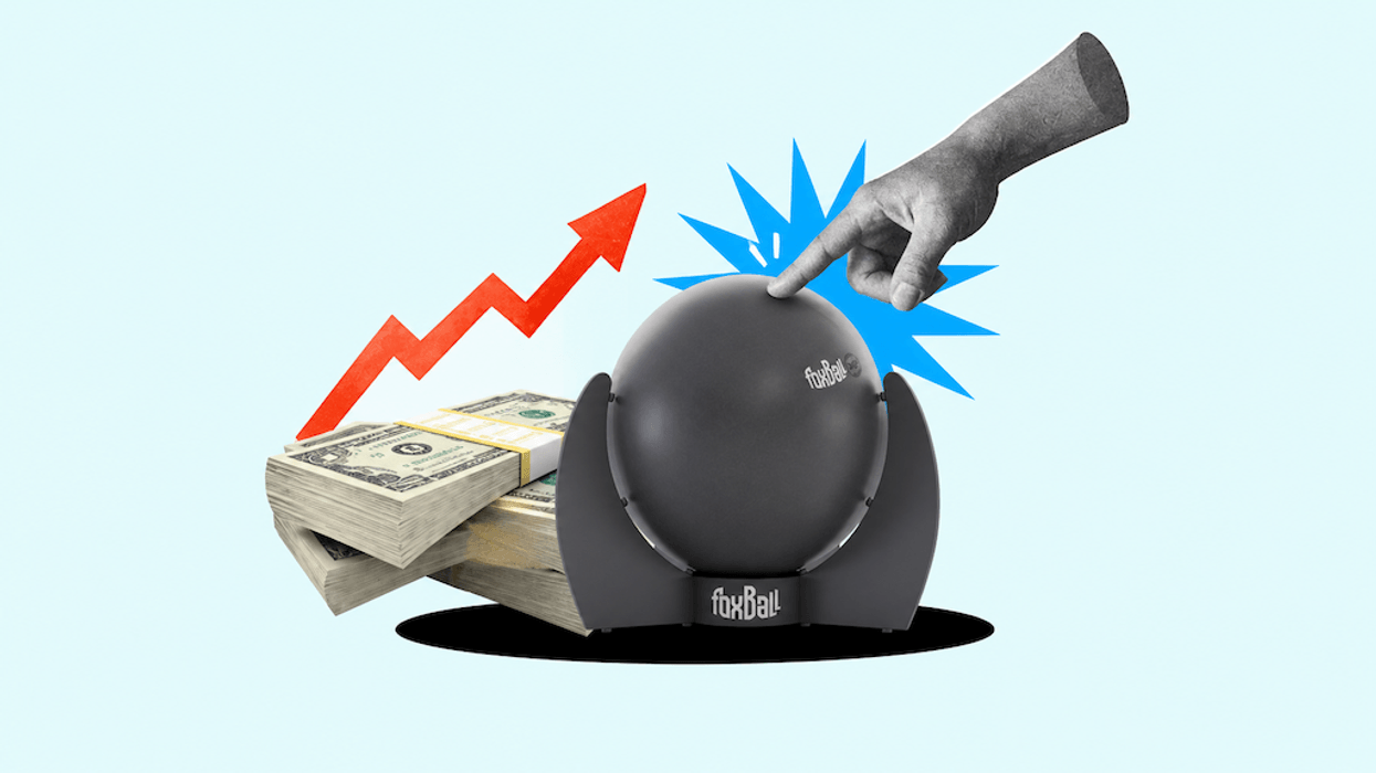 Hand pressing a SisyFox FoxBall devicel beside rising arrow and stacks of money.