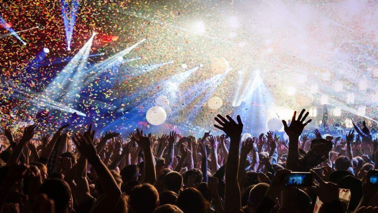 hands waving in auditorium - david hockley appointed CEO of picsolve