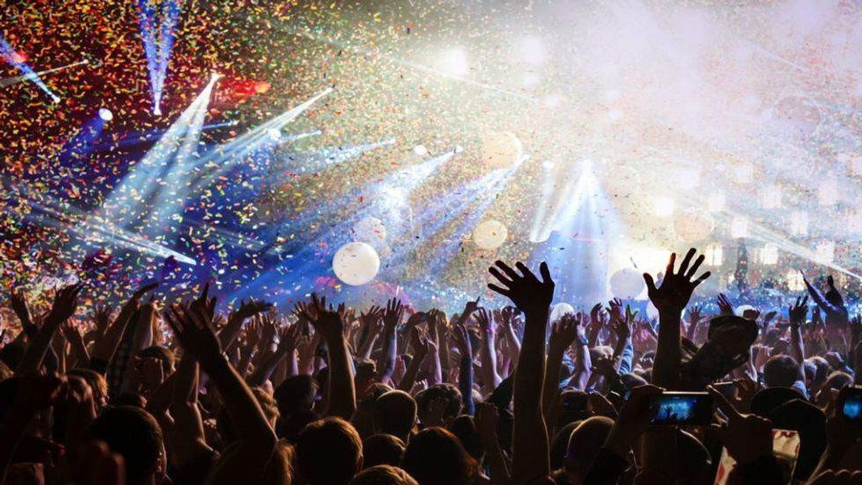 hands waving in auditorium - david hockley appointed CEO of picsolve