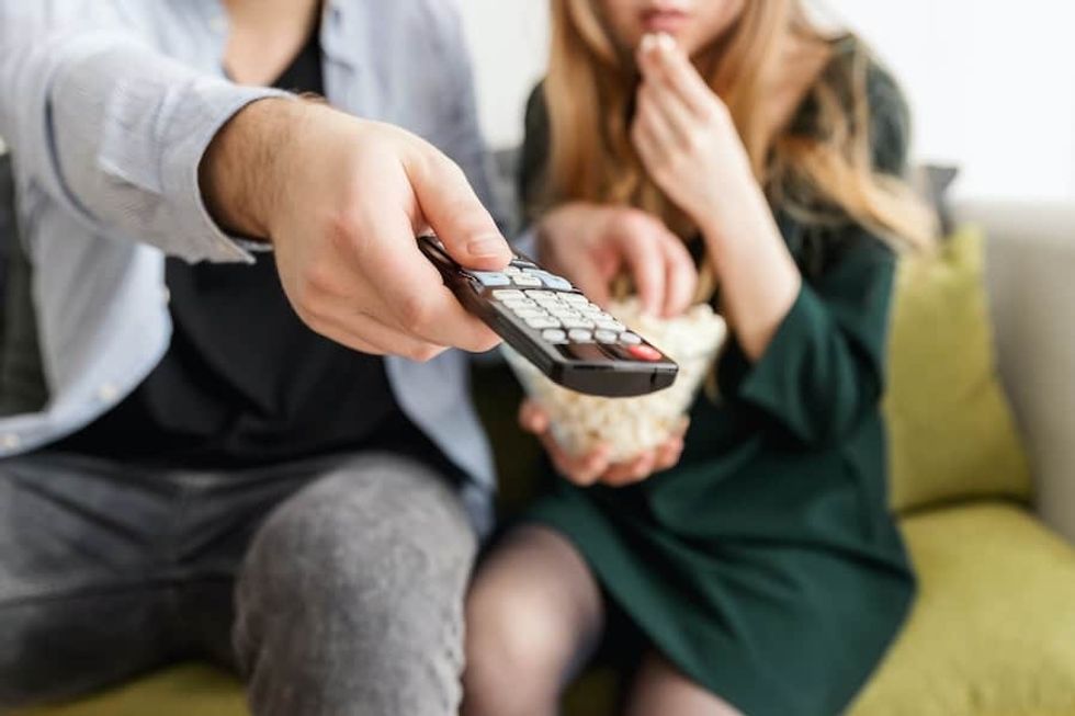 home movie night - coronavirus may impact the attractions industry in the long-term as people avoid crowded spaces such as cinemas and theme parks