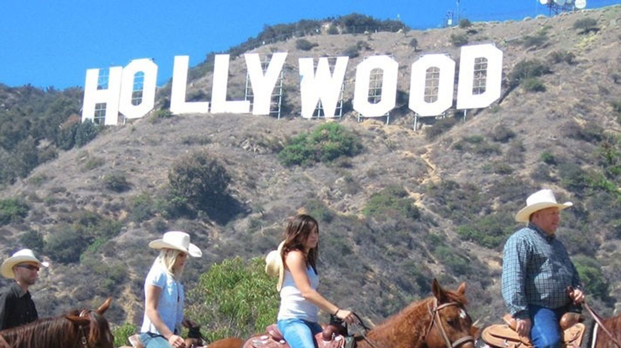 horseback riders on Karmel Shuttle tour to Hollywood sign