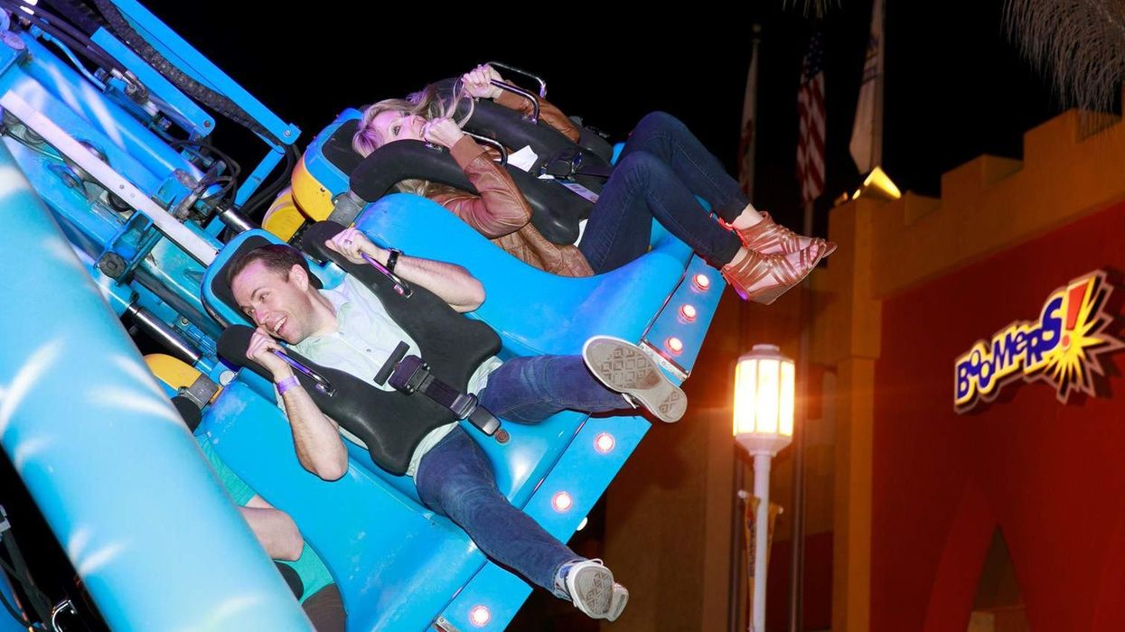 Iaapa FEC Summit people enjoying amusement ride