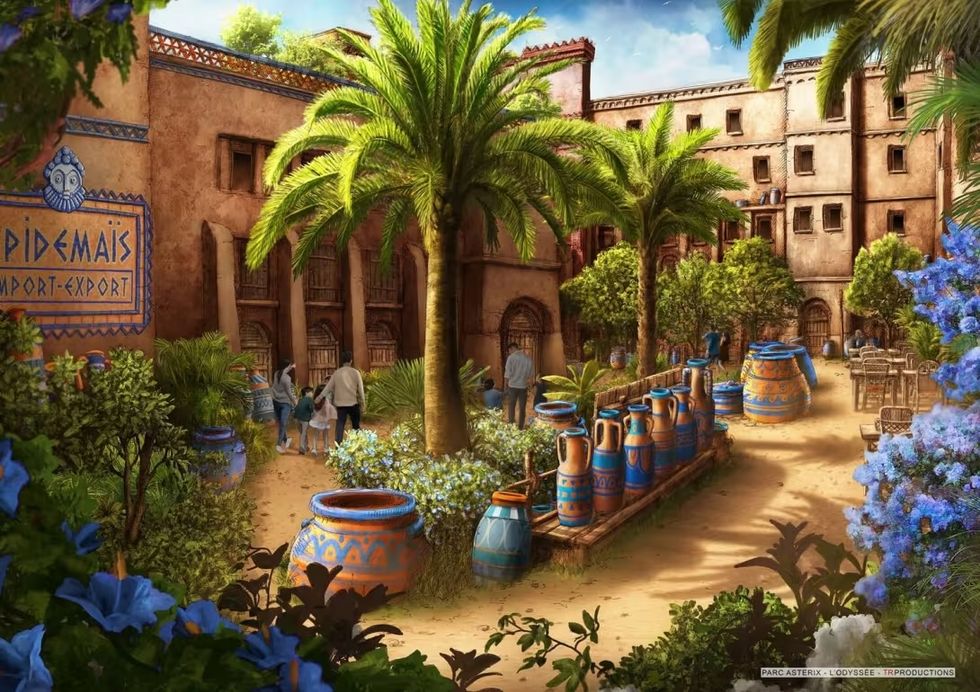 Illustrated North African courtyard at Parc Asterix with palm trees, pottery stalls, and visitors among sandy buildings.