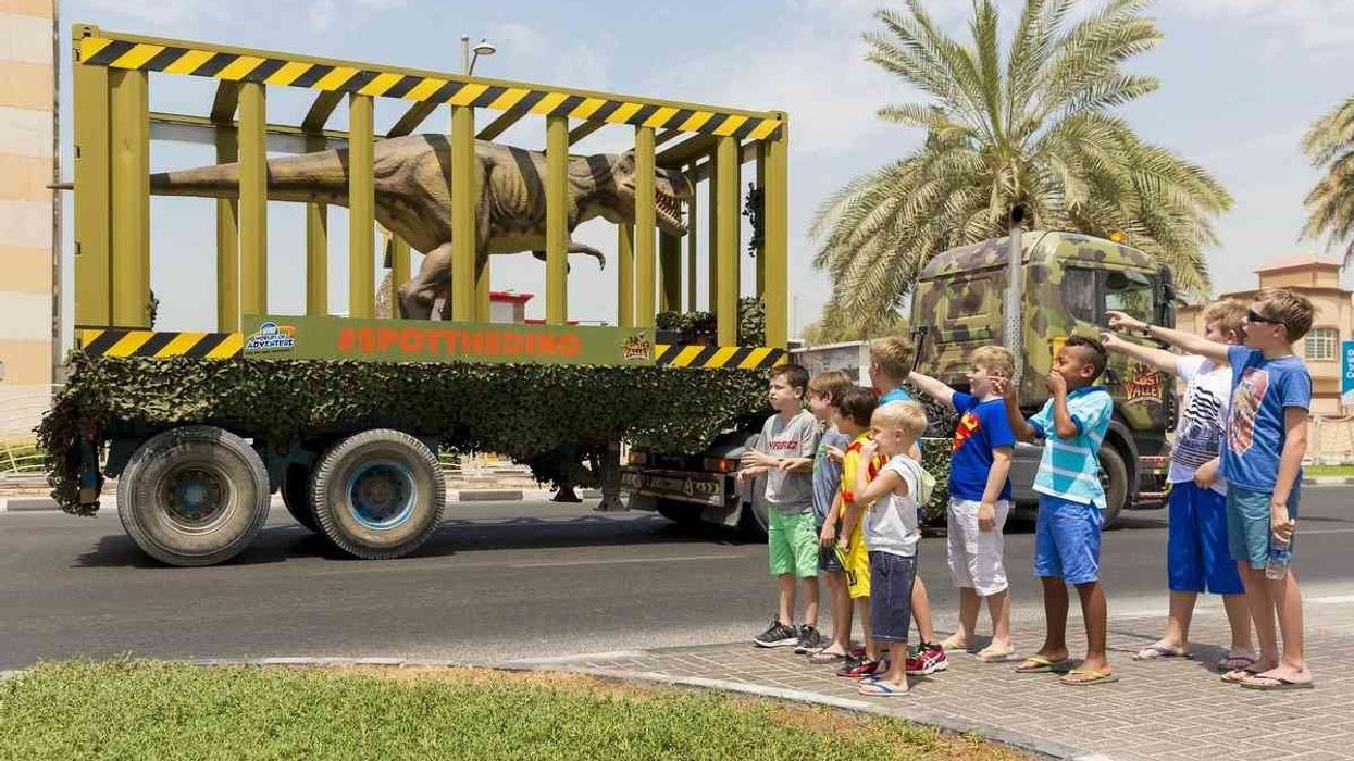 Dinosaurs Stop Traffic in Dubai en Route to IMG Worlds of Adventure