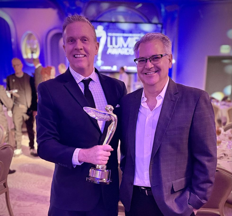 Immotion CEO Rod Findley and VP of Content Ken Musen celebrating their Lumiere win at the 16th Annual Lumiere Awards, held on 9 February at the iconic Beverly Hills Hotel.