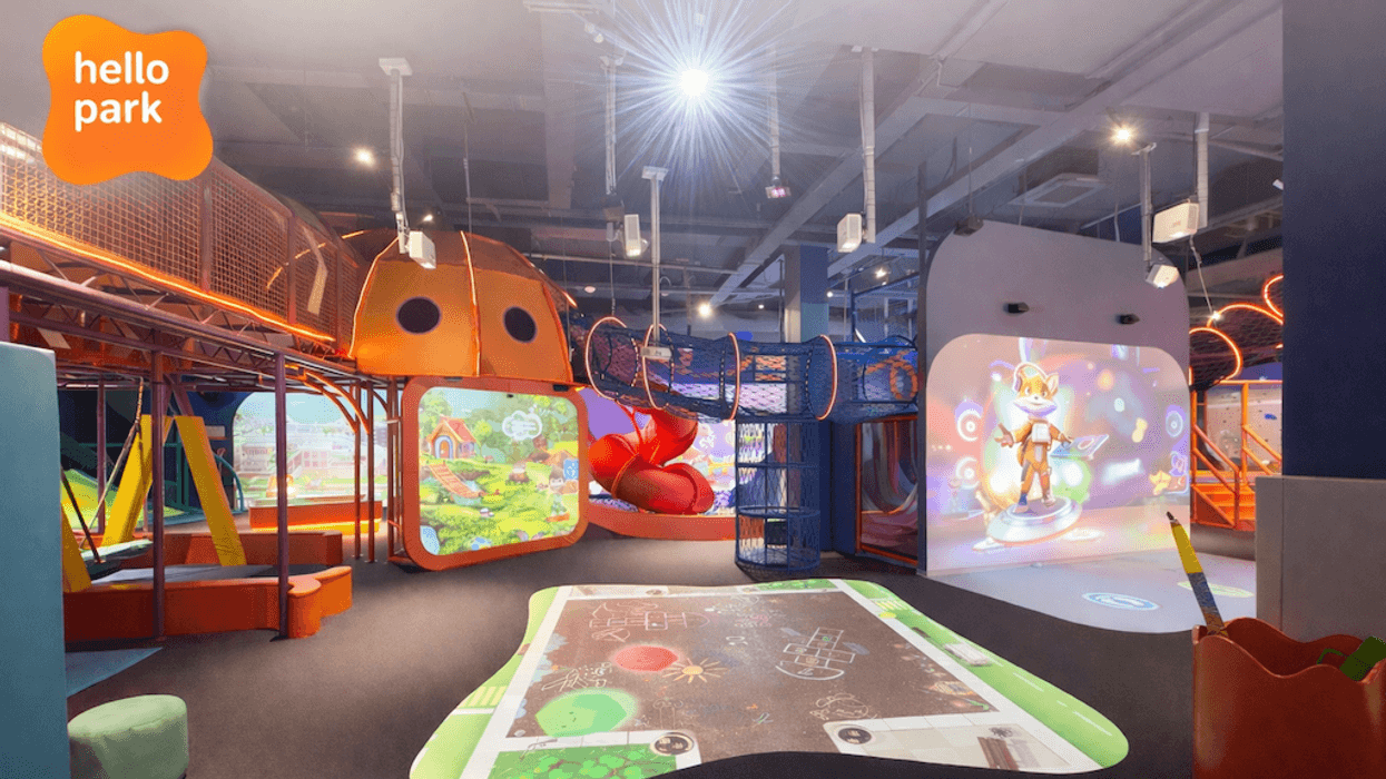 Indoor Hello Park play area with interactive displays and colorful climbing structures.