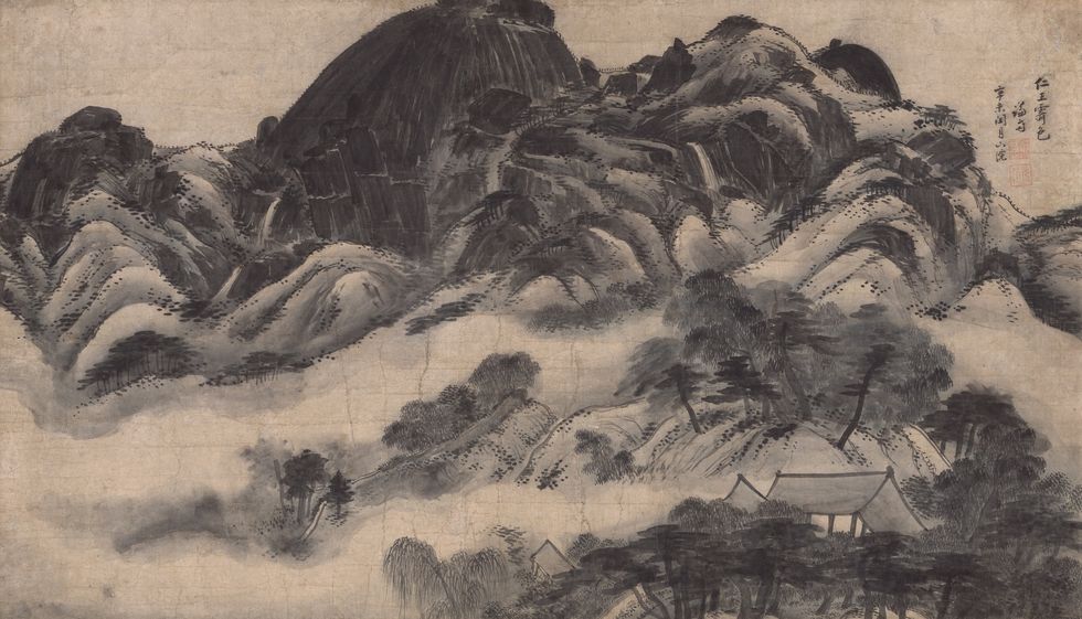 Ink landscape with mountains, trees, and traditional houses shrouded in mist.