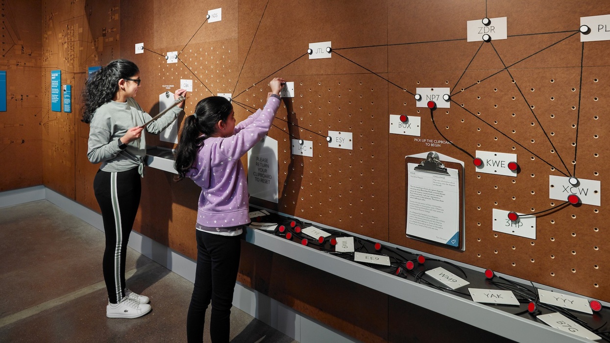 Intelligence-Factory-exhibit-Bletchley-Children-with-interactive-exhibit-credit-Andrew-Lee