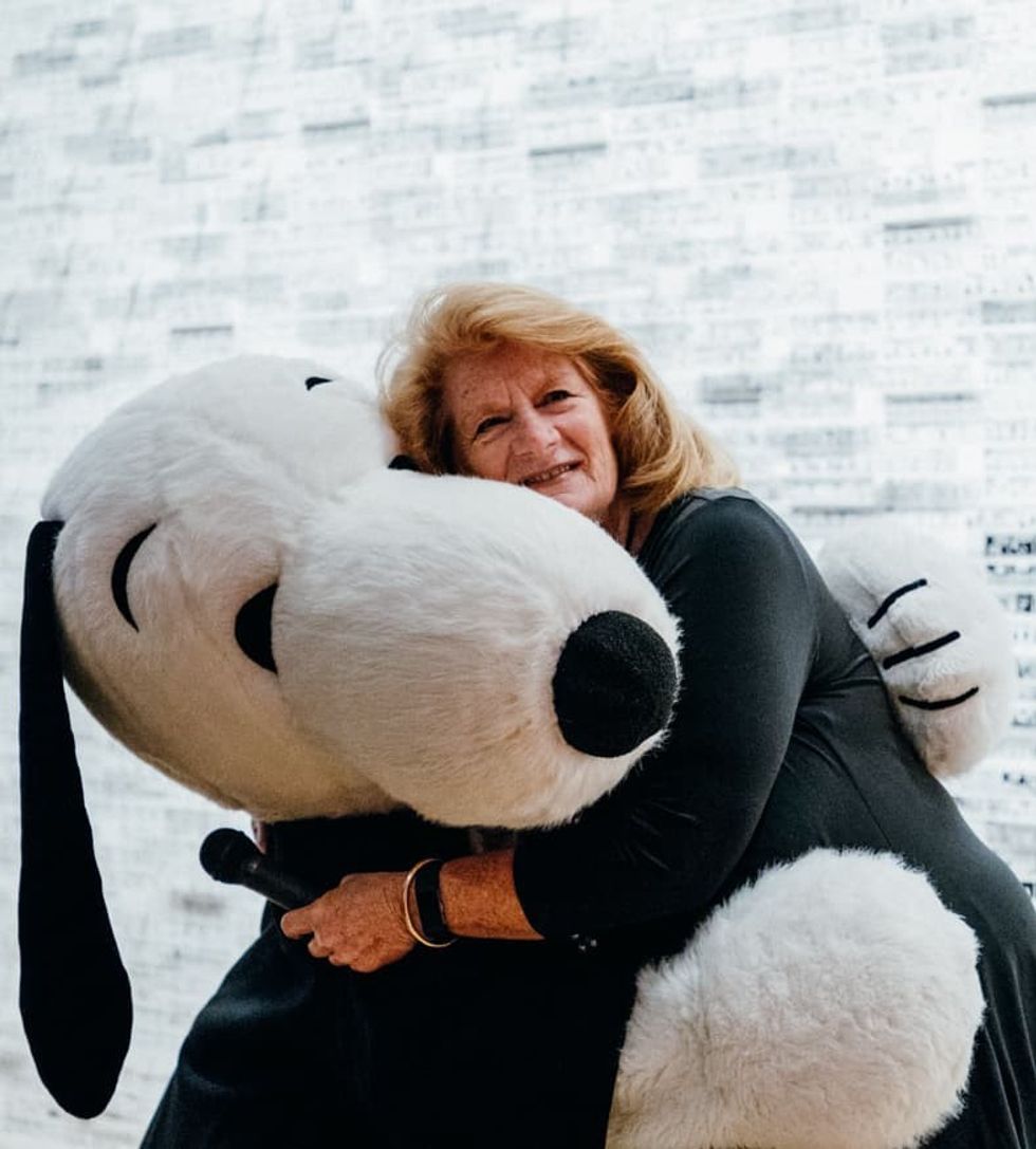 Karen Johnson, director of Charles M. Schulz Museum with Snoopy