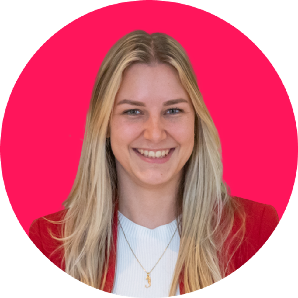Kimberley headshot on pink background