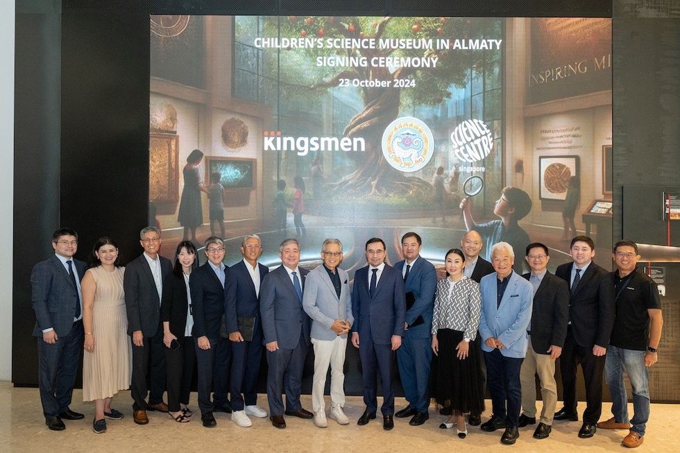 Kingsmen & Museum of Science for Children Kazakhstan teams at signing ceremony
