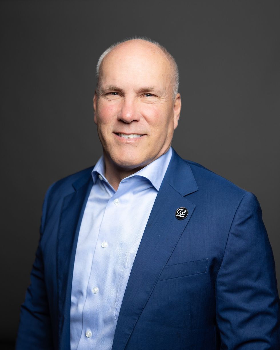 Kirk Johnson, COO at COSM