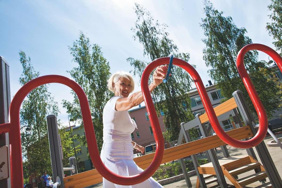 lady in play park senior play