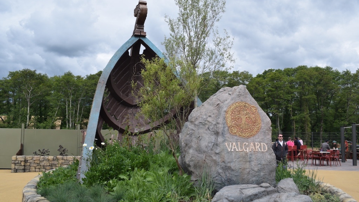 Large rock with "VALGARD" sign and a viking ship sculpture in Paultons Park