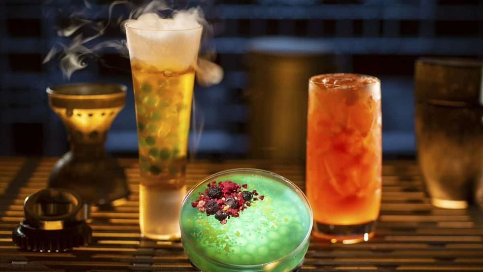 Left to right, non-alcoholic drinks: Carbon Freeze, Oga’s Obsession provision, and Cliff Dweller, available at Oga’s Cantina. (Kent Phillips/Disney Parks)