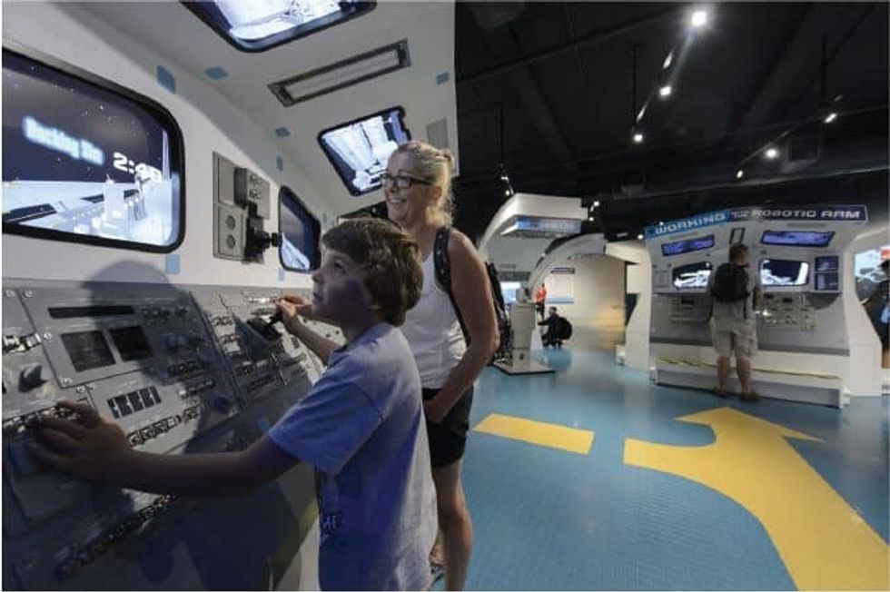 Lexington Companies of Nassal Space Shuttle Atlantis mother and son at exhibit