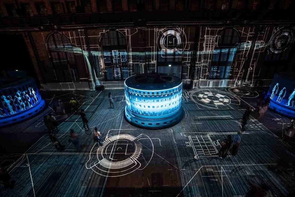 light projections on floor and buildings arial view