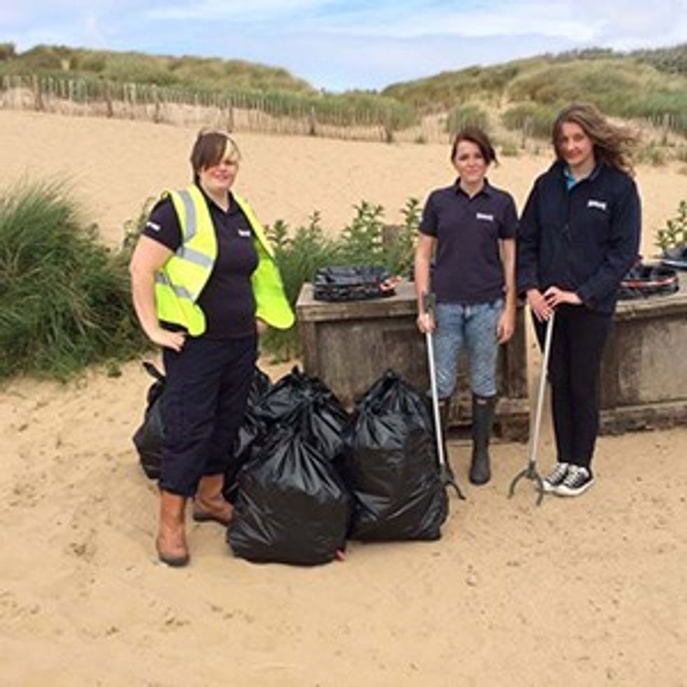 litter pickers beach rubbish group