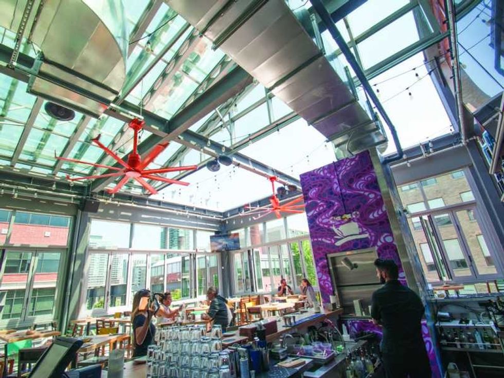 looking up inside openaire enclosure at barcelona tavern toronto