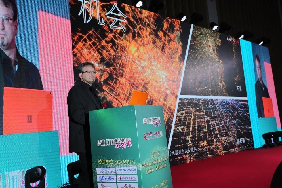 Louis speaks at the 2019 Asian Attraction Summit, raven sun creative anniversary