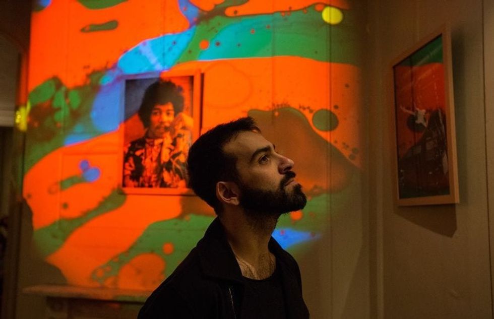 Male visitor appreciating the Handel and Hendrix exhibition