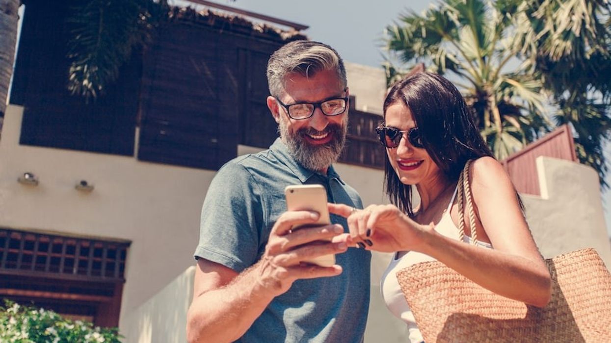 man and woman using app