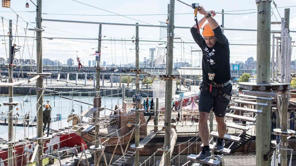 man on voiles en voiles ropes course powered by saferoller belay system by kanopeo