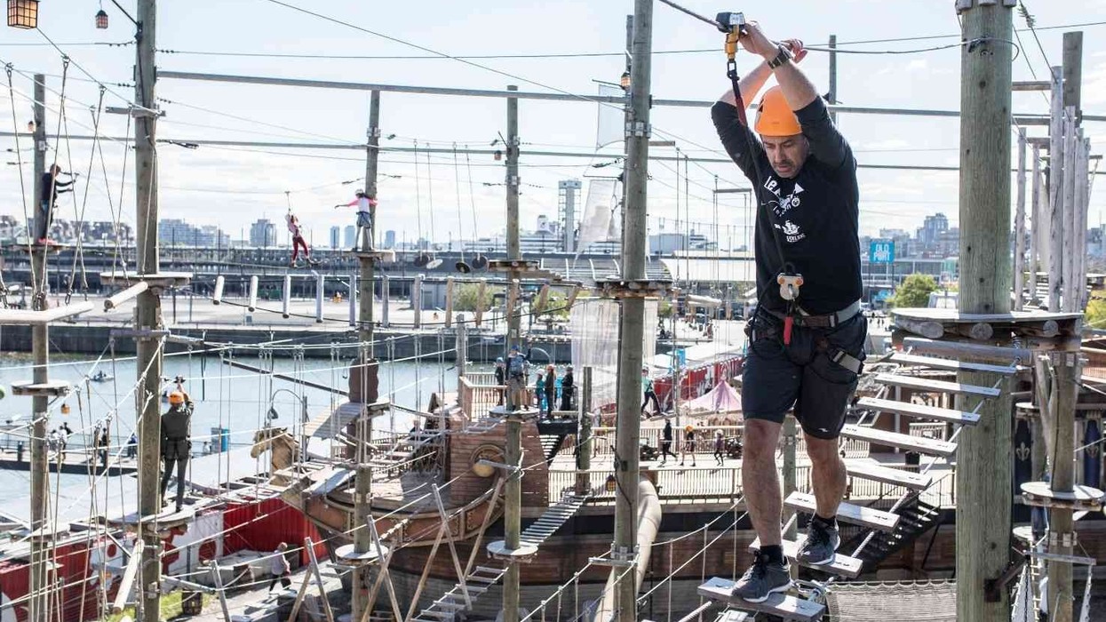 man on voiles en voiles ropes course powered by saferoller belay system by kanopeo
