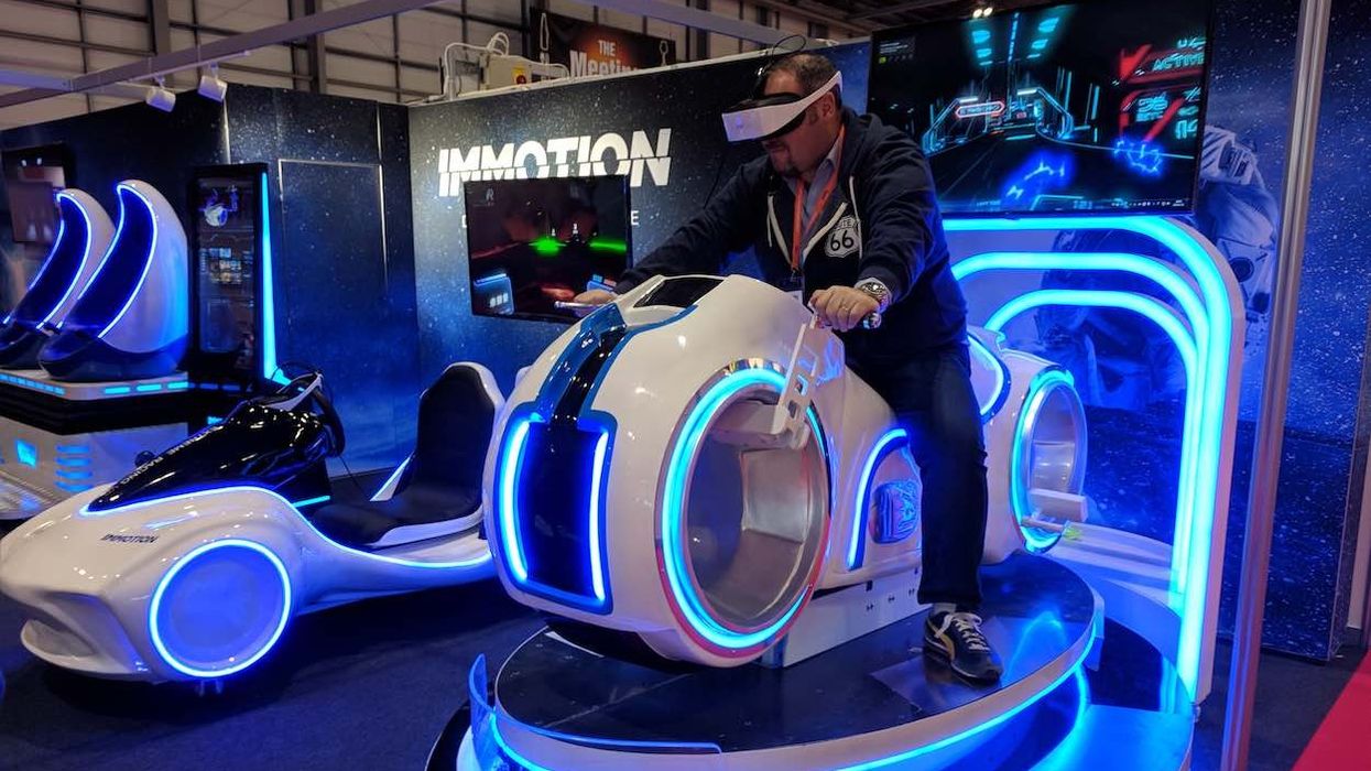 man on vr ride immotion group eag virtual reality a