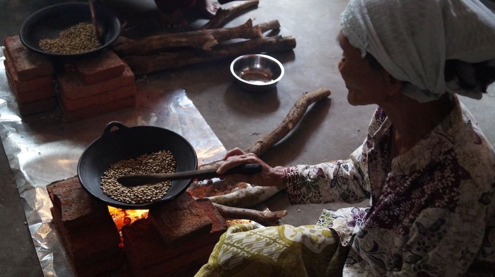 Mandai in situ conservation SwaraOra -grandma roasting coffee