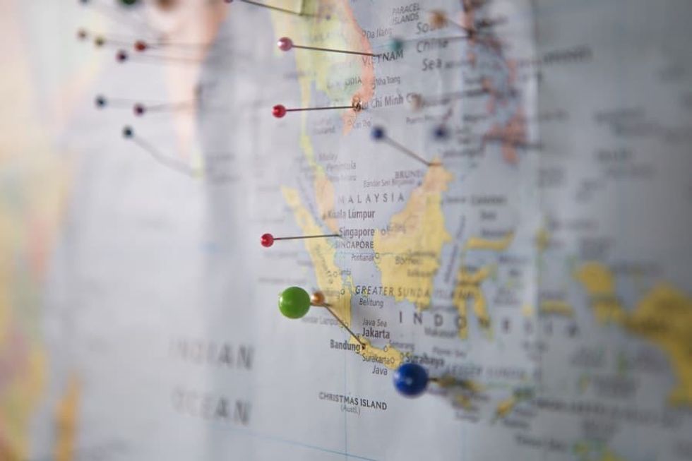 Map with pins. Nicole Srock.Stanley explores the trend for escapism and asks how travel retail needs to evolve