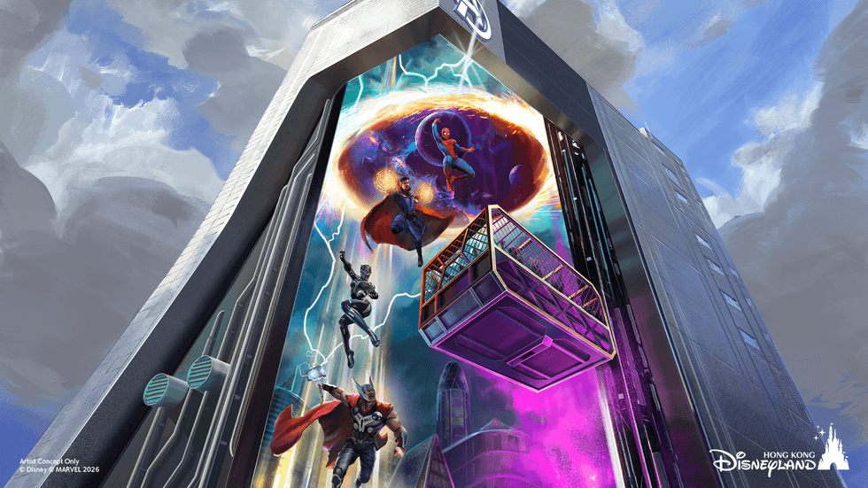 Marvel superheroes mural on a sleek, modern building with an elevator at Hong Kong Disneyland