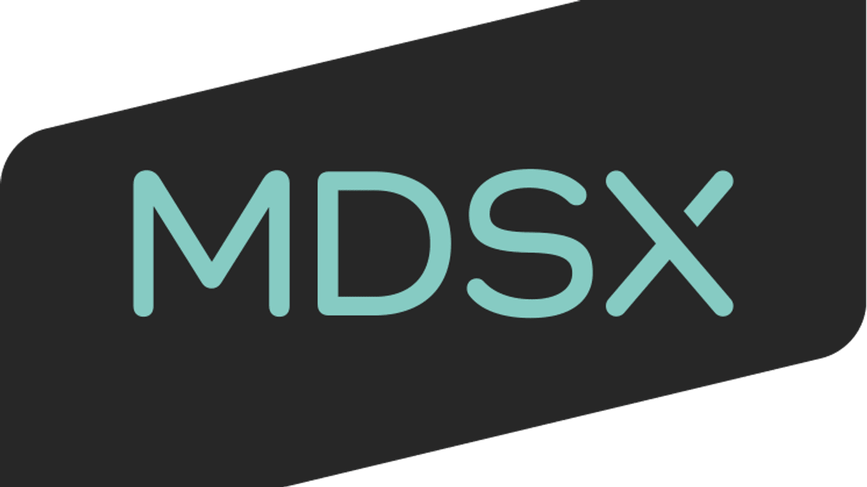 "MDSX logo in teal on a slanted dark gray background."