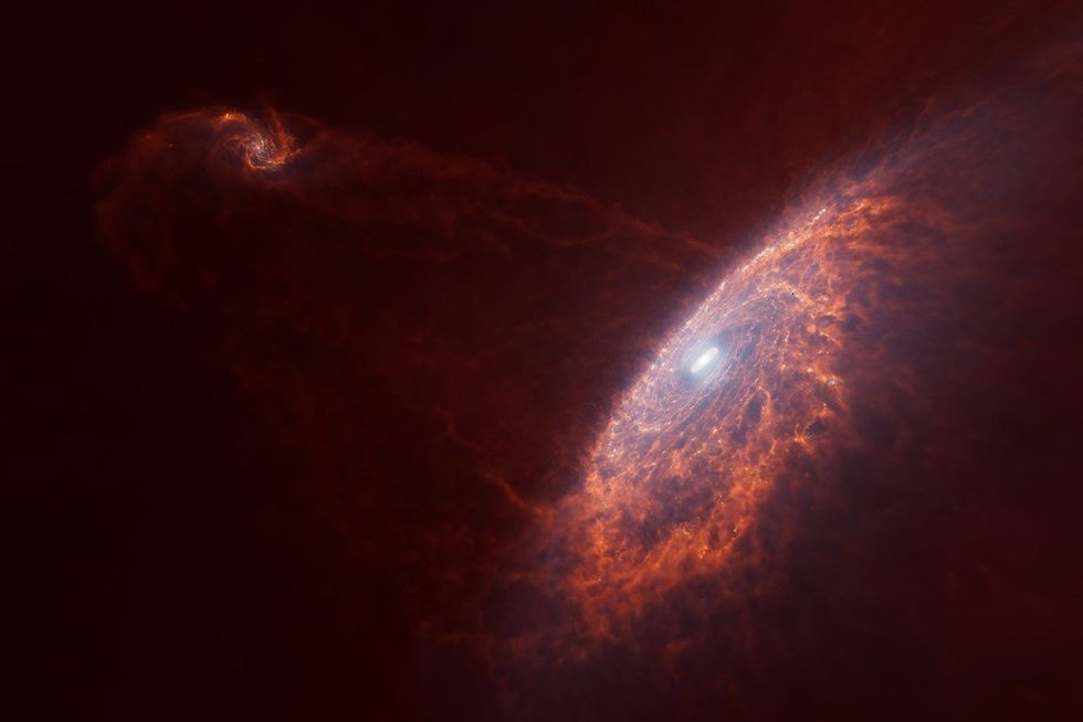 Milky Way collision with Sagittarius dwarf galaxy. Jon Parker / \u00a9AMNH