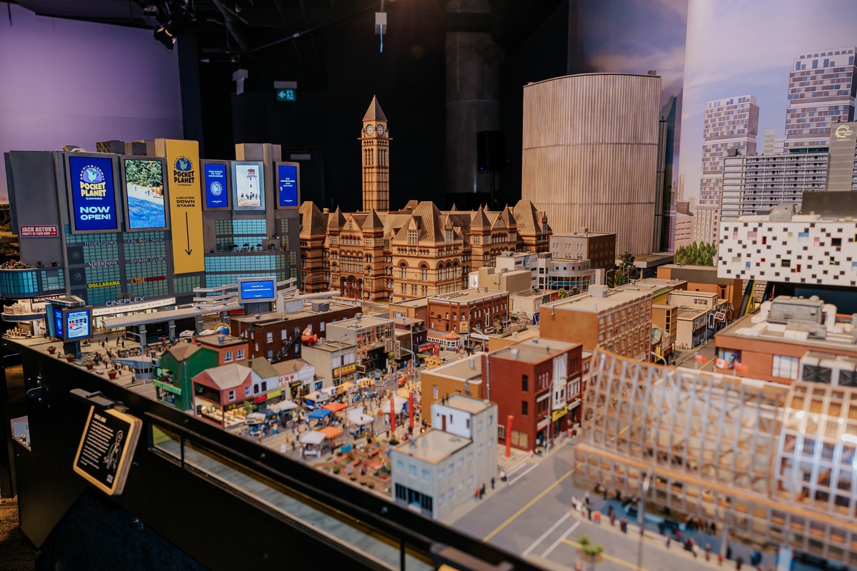 Miniature cityscape at Pocket Planet Canada with detailed buildings and vibrant urban scenery.