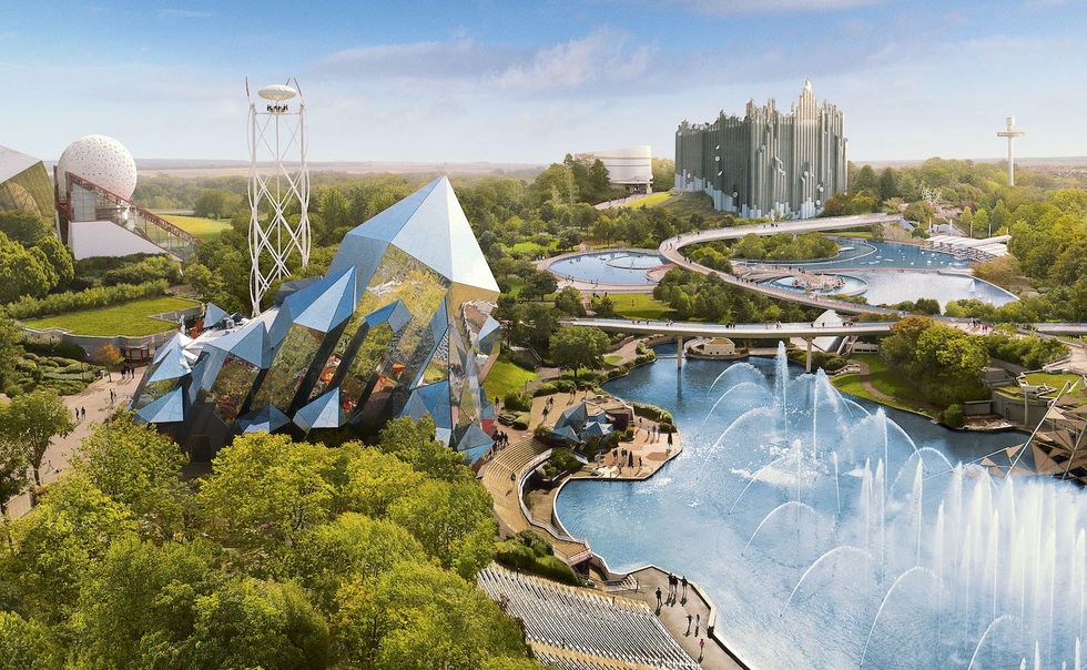 Modern amusement park with futuristic architecture, fountains, and lush greenery.