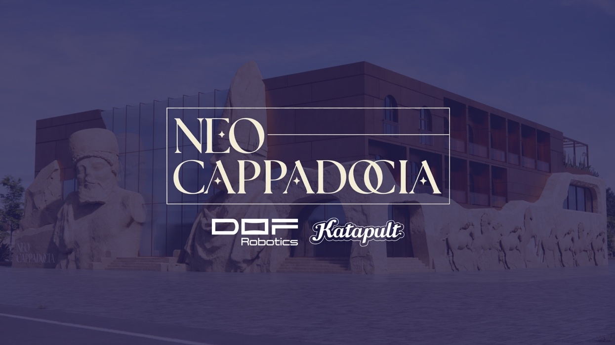 Modern building with large statues; text overlay: "Neo Cappadocia, DOF Robotics, Katapult."